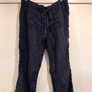 Navy linen pants with drawstring waist.